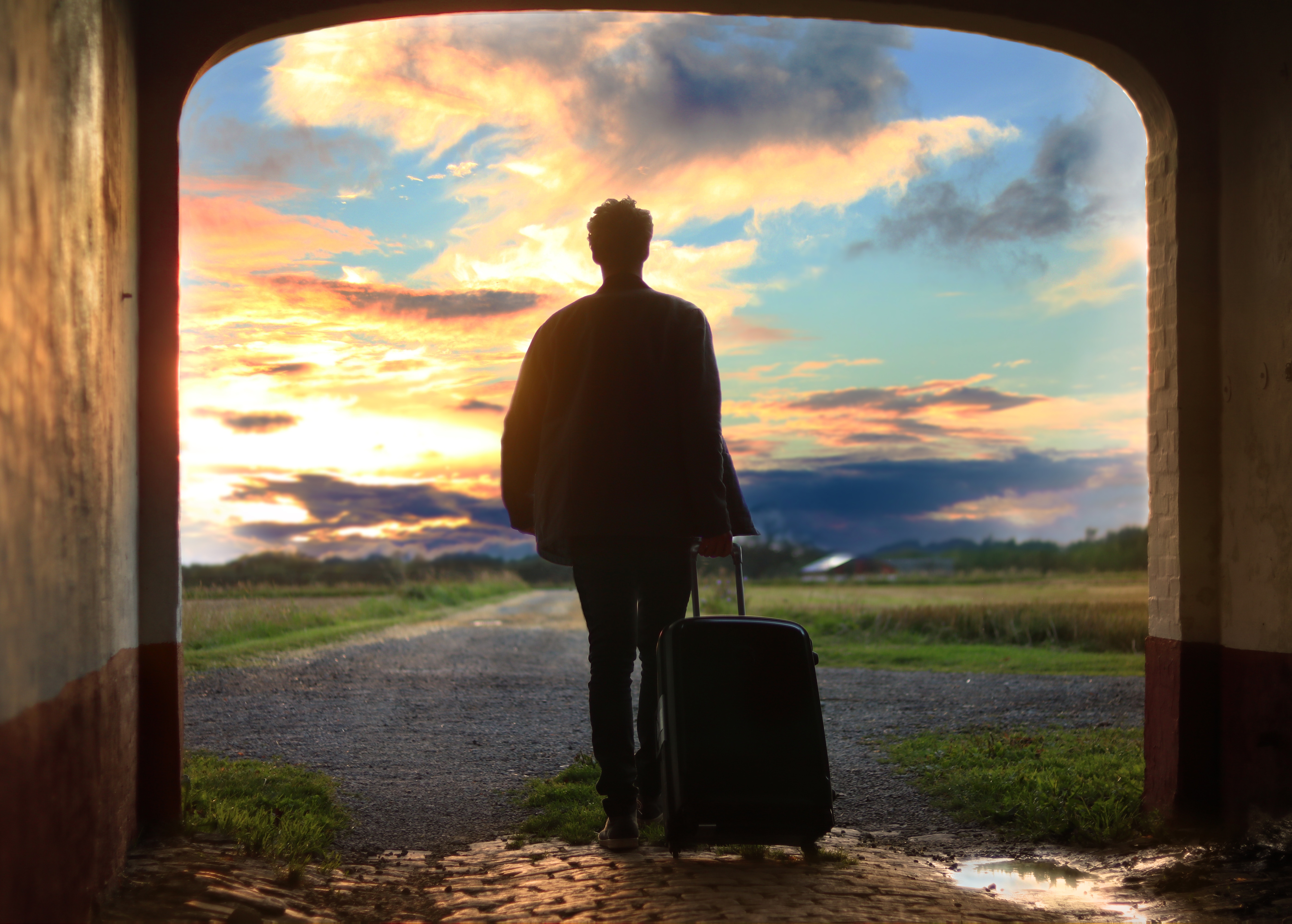 man walking with a suitcase